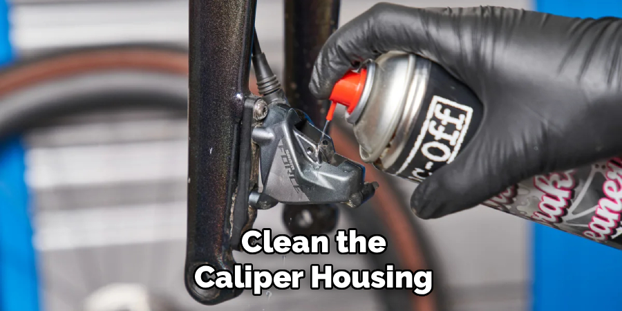 Clean the Caliper Housing